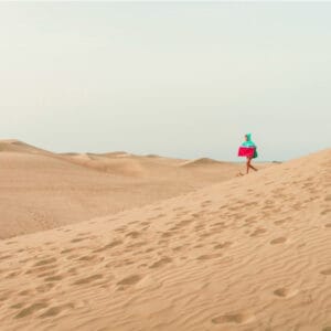 child crossing desert
