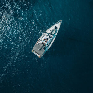 boat on a blue sea from above resilience
