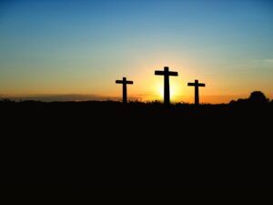 Three crucifixes at sunrise